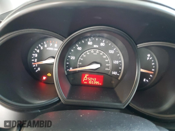 2013 Kia Rio LX z VIN KNADM4A30D6190131, wystawiony jako Copart lot #54657615 z przebiegiem 165 395 mil mil oraz Szkoda całkowita • Salvage title. Historia ofert i sprzedaży dostępna na DreamBid. Obrazek 9.