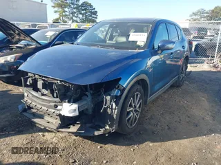 2018 Mazda CX-5 Grand Touring with VIN JM3KFADM9J1328501, listed as a IAAI auction lot 41408154 with 116,679 mi miles. Bid and sale history available at carsss.com. Image 18.
