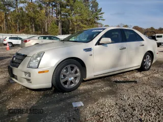 2010 Cadillac STS AWD z VIN 1G6DU6EV9A0138511, wystawiony jako Copart lot #81240324 z przebiegiem 113 493 mil mil oraz Szkody całkowita. Historia ofert i sprzedaży dostępna na DreamBid. Obrazek 1.