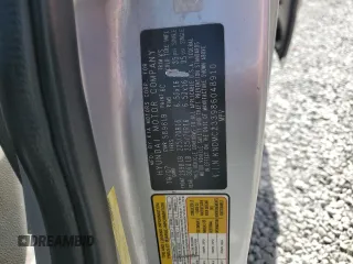 2008 Hyundai Entourage GLS z VIN KNDMC233986048910, wystawiony jako Copart lot #56009155 z przebiegiem 246 917 mil mil oraz Szkoda całkowita • Salvage title. Historia ofert i sprzedaży dostępna na DreamBid. Obrazek 13.