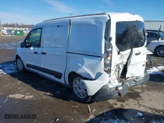 2015 Ford Transit Connect XLT with VIN NM0LS7F7XF1217950, listed as a IAAI auction lot 41269747 with 219,702 mi miles. Bid and sale history available at carsss.com. Image 3.