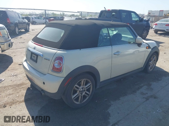 2013 MINI Convertible with VIN WMWZN3C58DT568824, listed as a IAAI auction lot 41998124 with 134,191 mi miles and . Bid and sale history available at DreamBid. Image 4.