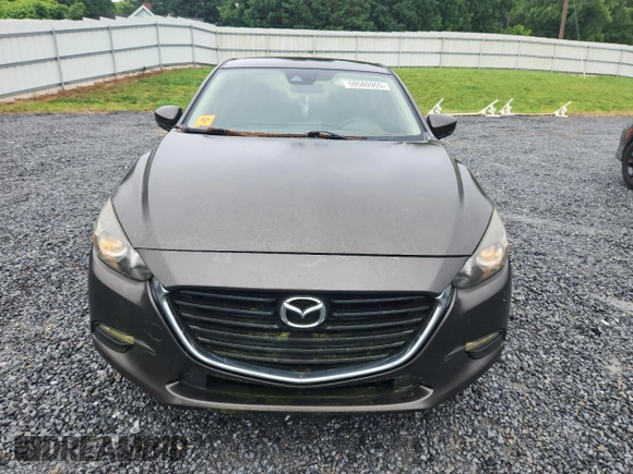 2017 Mazda 3 Touring z VIN 3MZBN1V70HM112387, wystawiony jako Copart lot #59580965 z przebiegiem 109 799 mil mil oraz Czysty tytuł • Clean title. Historia ofert i sprzedaży dostępna na DreamBid. Obrazek 5.