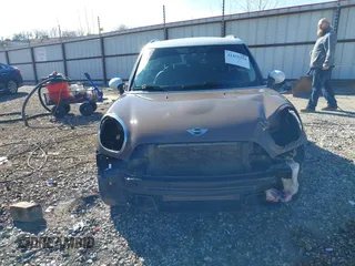 2014 MINI Countryman S with VIN WMWZC3C5XEWP52054, listed as a IAAI auction lot 41452354 with 104,873 mi miles and . Bid and sale history available at DreamBid. Image 13.