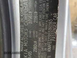2005 Kia Spectra LX with VIN KNAFE121955160165, listed as a Copart auction lot 74695764 with 160,670 mi miles and Salvage Title. Bid and sale history available at carsss.com. Image 12.