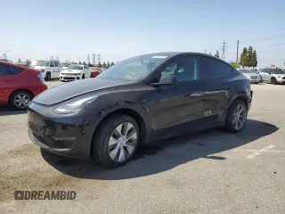 2024 Tesla Model Y Long Range with VIN 7SAYGDEE6RA219456, listed as a Copart auction lot 61855165 with 29,869 mi miles and Salvage title. Bid and sale history available at DreamBid. Image 1.