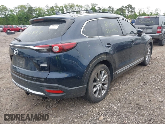 2018 Mazda CX-9 Grand Touring with VIN JM3TCBDY8J0209737, listed as a IAAI auction lot 42374826 with Not provided miles and . Bid and sale history available at DreamBid. Image 4.
