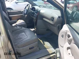 2001 Dodge Caravan ES with VIN 2B8GP54L51R198959, listed as a IAAI auction lot 41941050 with 208,396 mi miles and . Bid and sale history available at carsss.com. Image 5.