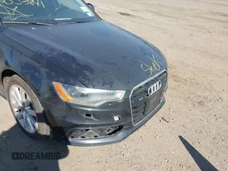 2013 Audi A6 Prestige z VIN WAUHGAFC6DN061185, wystawiony jako IAAI lot #42041086 z przebiegiem Nie podano mil oraz . Historia ofert i sprzedaży dostępna na DreamBid. Obrazek 6.