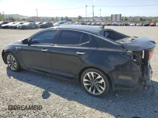 2015 Kia Optima SX Turbo with VIN 5XXGR4A6XFG454049, listed as a Copart auction lot 52217185 with 115,675 mi miles and Salvage Title. Bid and sale history available at carsss.com. Image 2.