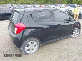 2020 Chevrolet Spark LS with VIN KL8CB6SA6LC407218, listed as a IAAI auction lot 39954901 with 77,256 mi miles and . Bid and sale history available at DreamBid. Image 4.