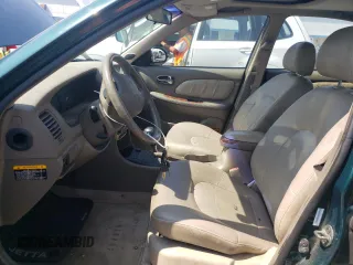 1999 Hyundai Sonata GLS with VIN KMHWF35V9XA100869, listed as a Copart auction lot 68219694 with 144,388 mi miles and Non Repairable. Bid and sale history available at carsss.com. Image 7.