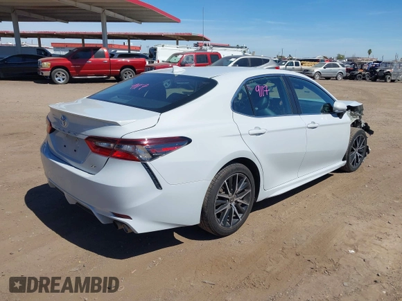 2023 Toyota Camry SE with VIN 4T1G11AK5PU126970, listed as a IAAI auction lot 42164749 with 51,623 mi miles. Bid and sale history available at carsss.com. Image 4.