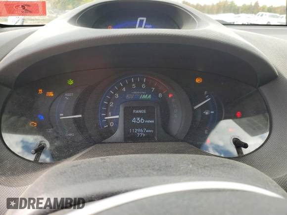 2013 Honda Insight with VIN JHMZE2H36DS002735, listed as a Copart auction lot 73602064 with 112,967 mi miles and Salvage title. Bid and sale history available at DreamBid. Image 9.