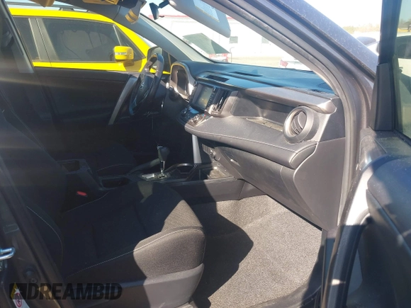 2018 Toyota RAV4 XLE with VIN JTMWFREV9JJ200629, listed as a IAAI auction lot 41821491 with 184,706 mi miles. Bid and sale history available at carsss.com. Image 5.