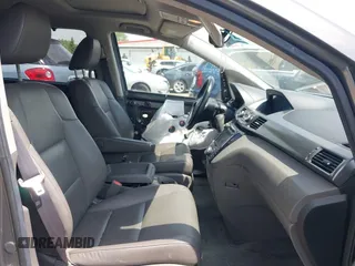 2014 Honda Odyssey EX-L z VIN 5FNRL5H64EB089875, wystawiony jako IAAI lot #42279431 z przebiegiem 107 716 mil mil oraz . Historia ofert i sprzedaży dostępna na DreamBid. Obrazek 5.