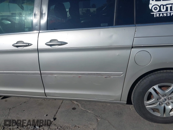 2005 Honda Odyssey EX-L z VIN 5FNRL38635B416982, wystawiony jako IAAI lot #42337383 z przebiegiem 350 647 mil mil oraz . Historia ofert i sprzedaży dostępna na DreamBid. Obrazek 6.