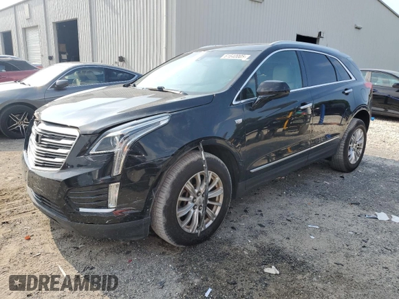 2017 Cadillac XT5 FWD with VIN 1GYKNARS0HZ283618, listed as a Copart auction lot 61640005 with 113,823 mi miles and Salvage title. Bid and sale history available at DreamBid. Image 1.
