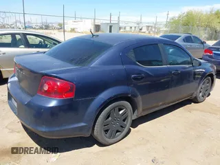 2014 Dodge Avenger SE with VIN 1C3CDZAB2EN129927, listed as a IAAI auction lot 42087663 with 197,339 mi miles. Bid and sale history available at carsss.com. Image 4.