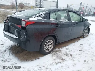 2019 Toyota Prius L Eco with VIN JTDKARFU9K3072837, listed as a IAAI auction lot 41303858 with 0 mi miles. Bid and sale history available at carsss.com. Image 4.