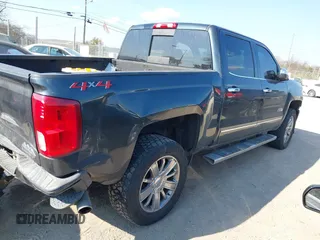2018 Chevrolet Silverado 1500 High Country with VIN 3GCUKTEC8JG308353, listed as a IAAI auction lot 40714183 with 88,711 mi miles and . Bid and sale history available at DreamBid. Image 4.
