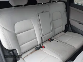 2018 Hyundai Tucson SE z VIN KM8J2CA41JU807280, wystawiony jako IAAI lot #42301977 z przebiegiem 62 415 mil mil oraz . Historia ofert i sprzedaży dostępna na DreamBid. Obrazek 8.