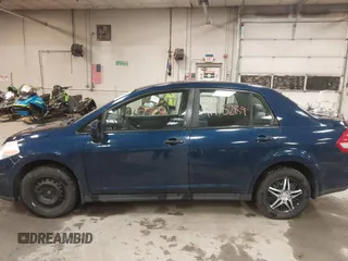 2009 Nissan Versa 1.8 S with VIN 3N1BC11E79L440560, listed as a IAAI auction lot 41975289 with 158,726 mi miles. Bid and sale history available at carsss.com. Image 12.