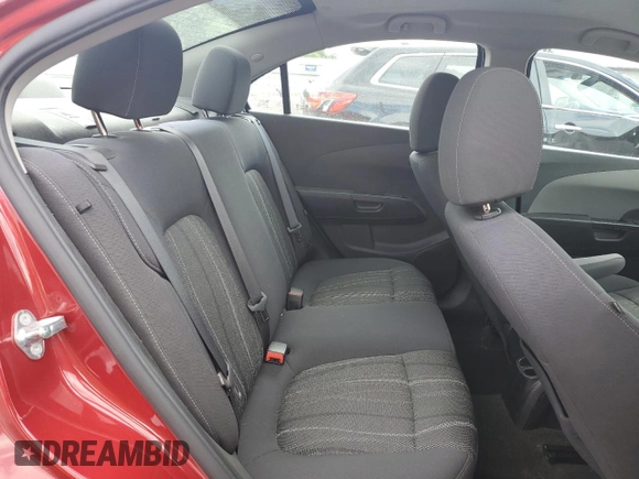 2016 Chevrolet Sonic LT z VIN 1G1JC5SG4G4175558, wystawiony jako Copart lot #57991275 z przebiegiem 133 497 mil mil oraz Szkoda całkowita • Salvage title. Historia ofert i sprzedaży dostępna na DreamBid. Obrazek 10.
