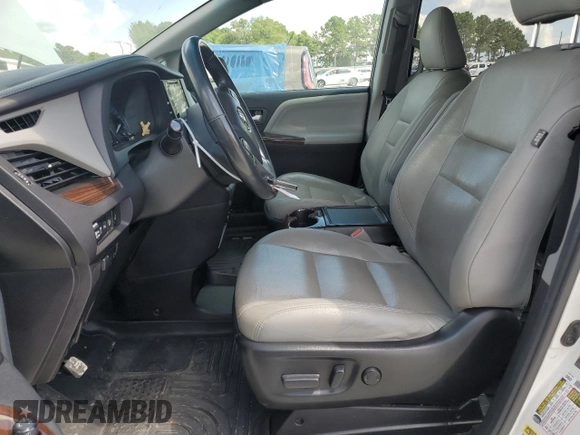 2015 Toyota Sienna XLE with VIN 5TDYK3DC0FS543020, listed as a Copart auction lot 61479225 with 221,814 mi miles and Salvage title. Bid and sale history available at DreamBid. Image 7.
