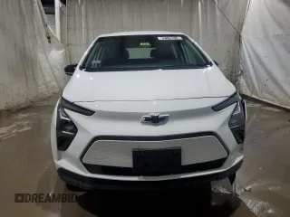 2023 Chevrolet Bolt EV 1LT with VIN 1G1FW6S0XP4182276, listed as a Copart auction lot 82176514 with 7,335 mi miles and Clean title. Bid and sale history available at DreamBid. Image 5.