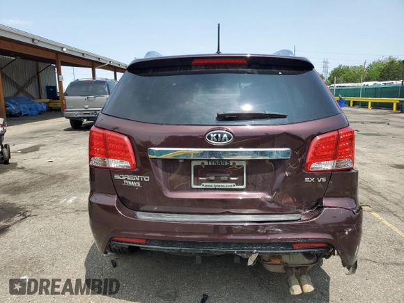 2013 Kia Sorento SX with VIN 5XYKWDA2XDG363999, listed as a Copart auction lot 58200985 with 69,056 mi miles and Salvage title. Bid and sale history available at DreamBid. Image 6.