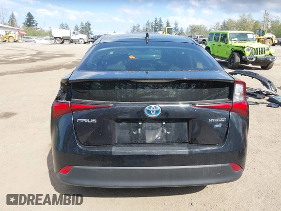 2021 Toyota Prius L Eco with VIN JTDKAMFU3M3140233, listed as a IAAI auction lot 42182685 with 38,842 mi miles and . Bid and sale history available at DreamBid. Image 17.