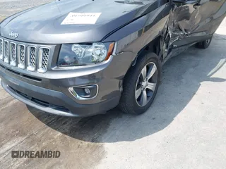 2016 Jeep Compass High Altitude Edition with VIN 1C4NJDEB0GD558230, listed as a IAAI auction lot 39799941 with 57,002 mi miles. Bid and sale history available at carsss.com. Image 14.