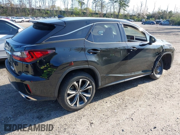 2019 Lexus RX with VIN 2T2BZMCA3KC193615, listed as a IAAI auction lot 42097232 with 33,797 mi miles. Bid and sale history available at carsss.com. Image 4.