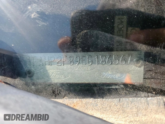 2014 Ford Taurus Limited with VIN 1FAHP2F89EG186567, listed as a Copart auction lot 61404285 with 188,890 mi miles and Salvage title. Bid and sale history available at DreamBid. Image 13.