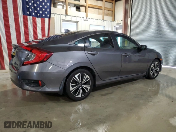 2017 Honda Civic EX-T with VIN 19XFC1E33HE002225, listed as a Copart auction lot 79443224 with 138,738 mi miles and Salvage Title. Bid and sale history available at DreamBid. Image 3.