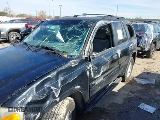 2003 GMC Envoy SLE with VIN 1GKDS13S732134354, listed as a IAAI auction lot 41305506 with 221,733 mi miles. Bid and sale history available at carsss.com. Image 6.