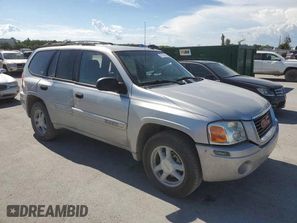 2004 GMC Envoy SLT с VIN 1GKDS13S542129977, выставлен на аукционе Copart как лот 61170465 с пробегом 129 897 миль миль и Списание • Salvage title. История ставок и продаж доступна на DreamBid. Изображение 4.