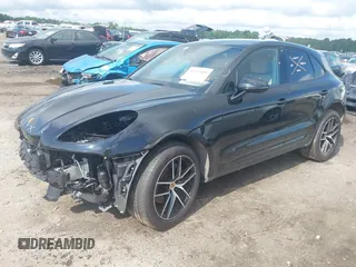 2025 Porsche Macan with VIN WP1AA2A52SLB05856, listed as a IAAI auction lot 42413898 with 5,721 mi miles and . Bid and sale history available at DreamBid. Image 2.