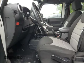2015 Jeep Wrangler Unlimited Rubicon with VIN 1C4BJWFGXFL518301, listed as a Copart auction lot 61910775 with 153,945 mi miles and Clean title. Bid and sale history available at DreamBid. Image 7.