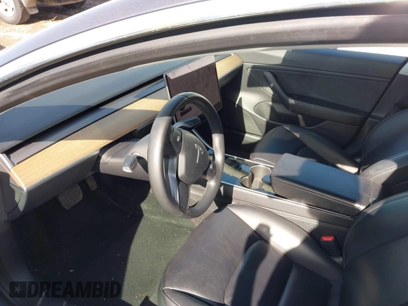 2020 Tesla Model 3 Long Range with VIN 5YJ3E1EB6LF666624, listed as a IAAI auction lot 41720664 with 65,973 mi miles. Bid and sale history available at carsss.com. Image 5.