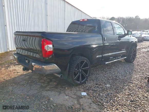2014 Toyota Tundra 2WD Truck SR with VIN 5TFRM5F1XEX074579, listed as a IAAI auction lot 41540661 with 132,505 mi miles. Bid and sale history available at carsss.com. Image 4.