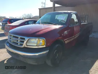 1999 Ford F-150 with VIN 1FTZF1722XKA76885, listed as a IAAI auction lot 41824733 with Not provided miles and . Bid and sale history available at DreamBid. Image 2.