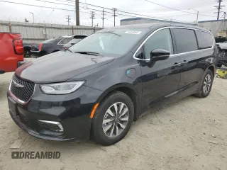 2023 Chrysler Pacifica Hybrid Touring L z VIN 2C4RC1L78PR541746, wystawiony jako Copart lot #54633865 z przebiegiem 5291 mil mil oraz Nie do naprawy. Historia ofert i sprzedaży dostępna na DreamBid. Obrazek 1.
