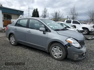 2010 Nissan Versa S with VIN 3N1BC1APXAL411429, listed as a Copart auction lot 50638725 with 95,893 mi miles and Salvage Title. Bid and sale history available at DreamBid. Image 4.