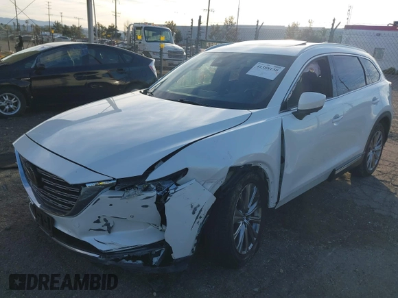2021 Mazda CX-9 Signature with VIN JM3TCBEY6M0536883, listed as a IAAI auction lot 41388130 with 65,613 mi miles. Bid and sale history available at carsss.com. Image 2.