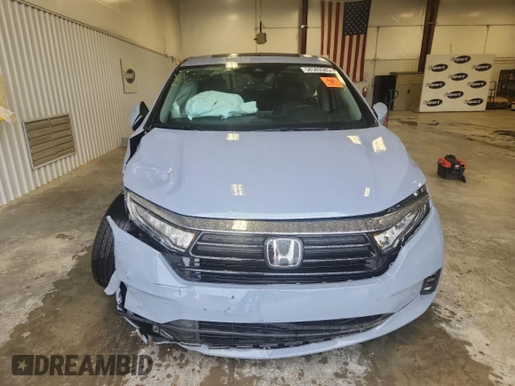 2023 Honda Odyssey Elite with VIN 5FNRL6H90PB071988, listed as a Copart auction lot 58589585 with 12,998 mi miles and Salvage title. Bid and sale history available at DreamBid. Image 5.