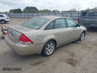 2005 Mercury Montego with VIN 1MEHM40195G606109, listed as a IAAI auction lot 40739316 with 329,715 mi miles. Bid and sale history available at carsss.com. Image 4.