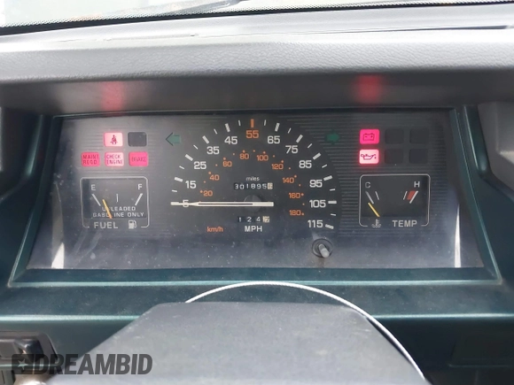 1992 Mitsubishi Mighty Max z VIN JA7FL24W5NP011633, wystawiony jako IAAI lot #41864873 z przebiegiem 301 895 mil mil oraz . Historia ofert i sprzedaży dostępna na DreamBid. Obrazek 7.