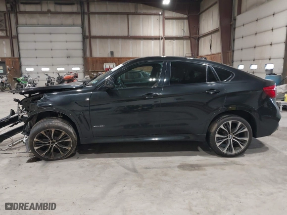 2019 BMW X6 xDrive35i with VIN 5UXKU2C51K0Z64897, listed as a IAAI auction lot 41759156 with 64,434 mi miles. Bid and sale history available at carsss.com. Image 13.